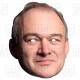 Ed Davey Liberal Democrat Leader card face mask with an elastic strap attached.